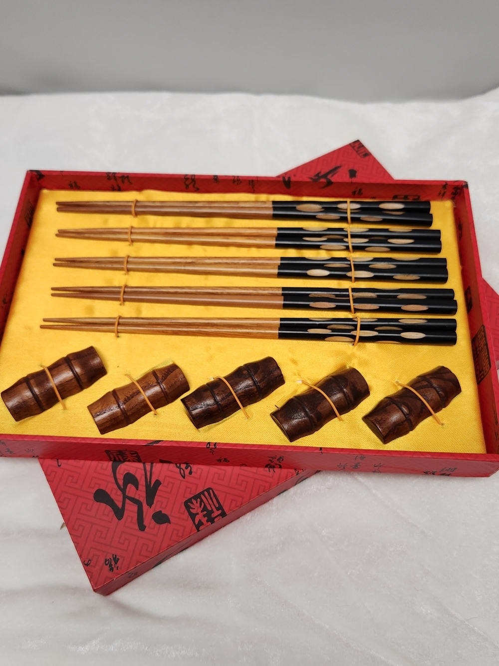 Bamboo Chopsticks Set with Black Accents and Brown Rests